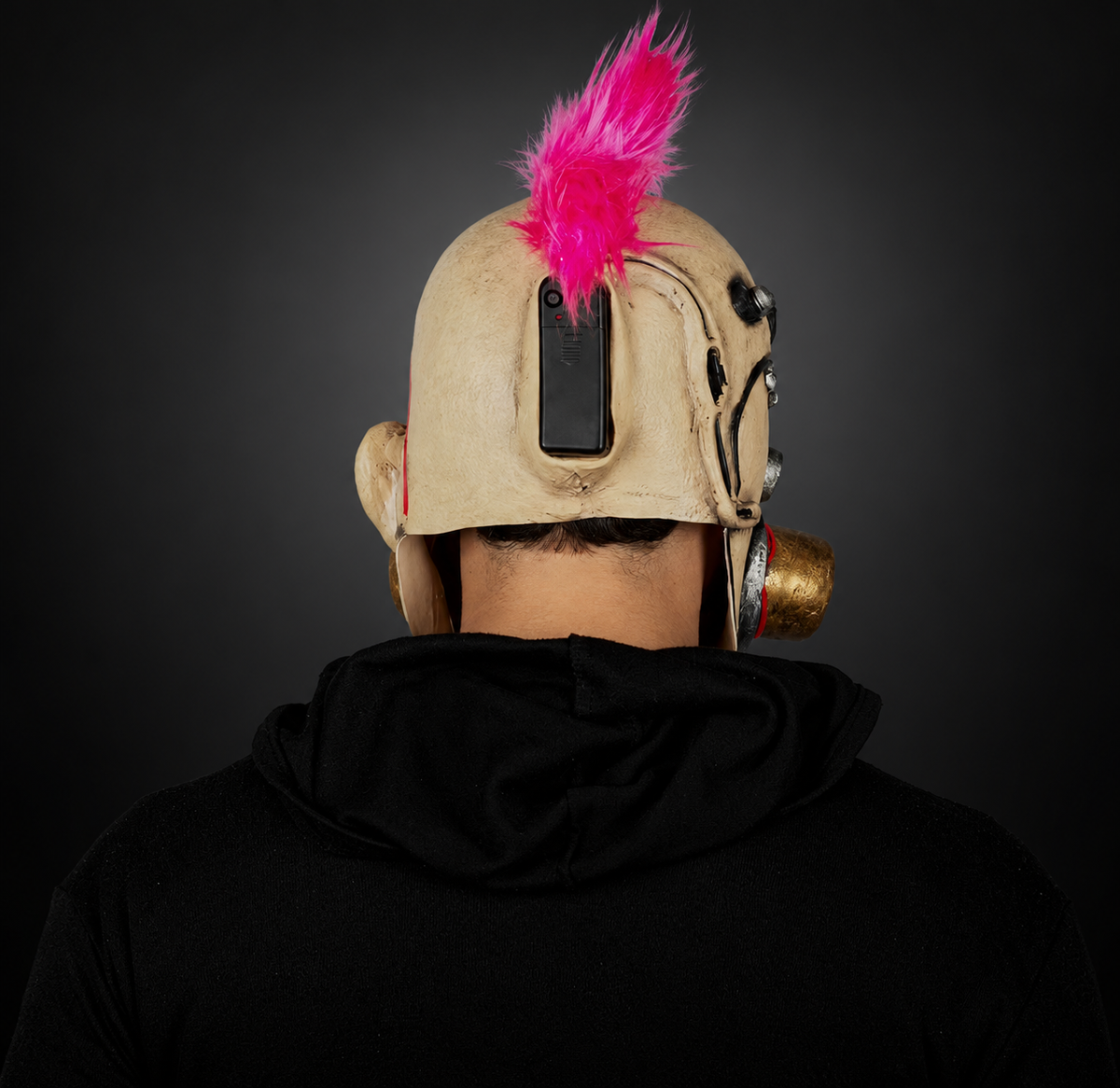 Clown Muzzle mask, rear view on model against smooth dark charcoal and grey gradient