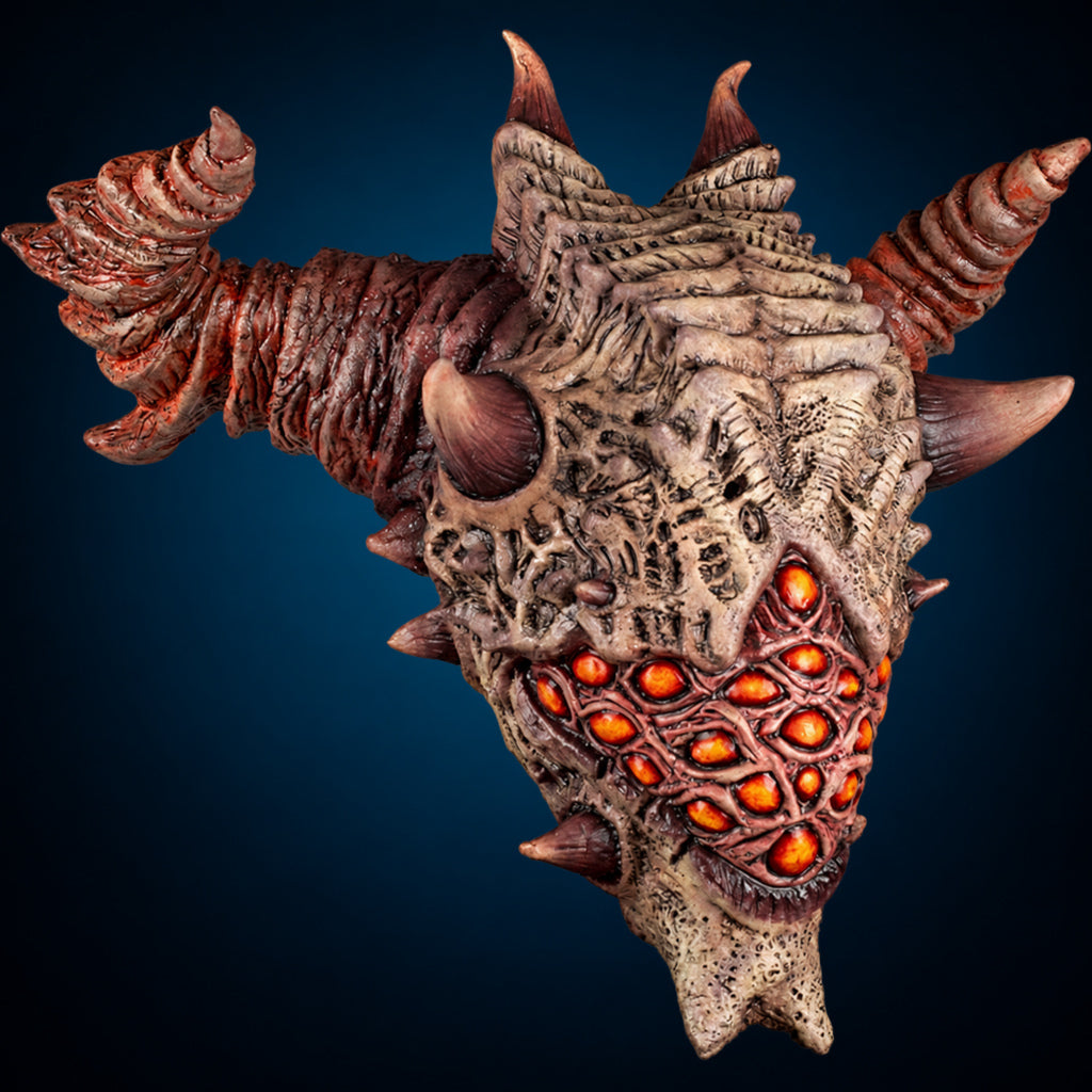 Aurixis mask, view 1, against a smooth dark blue-teal gradient background