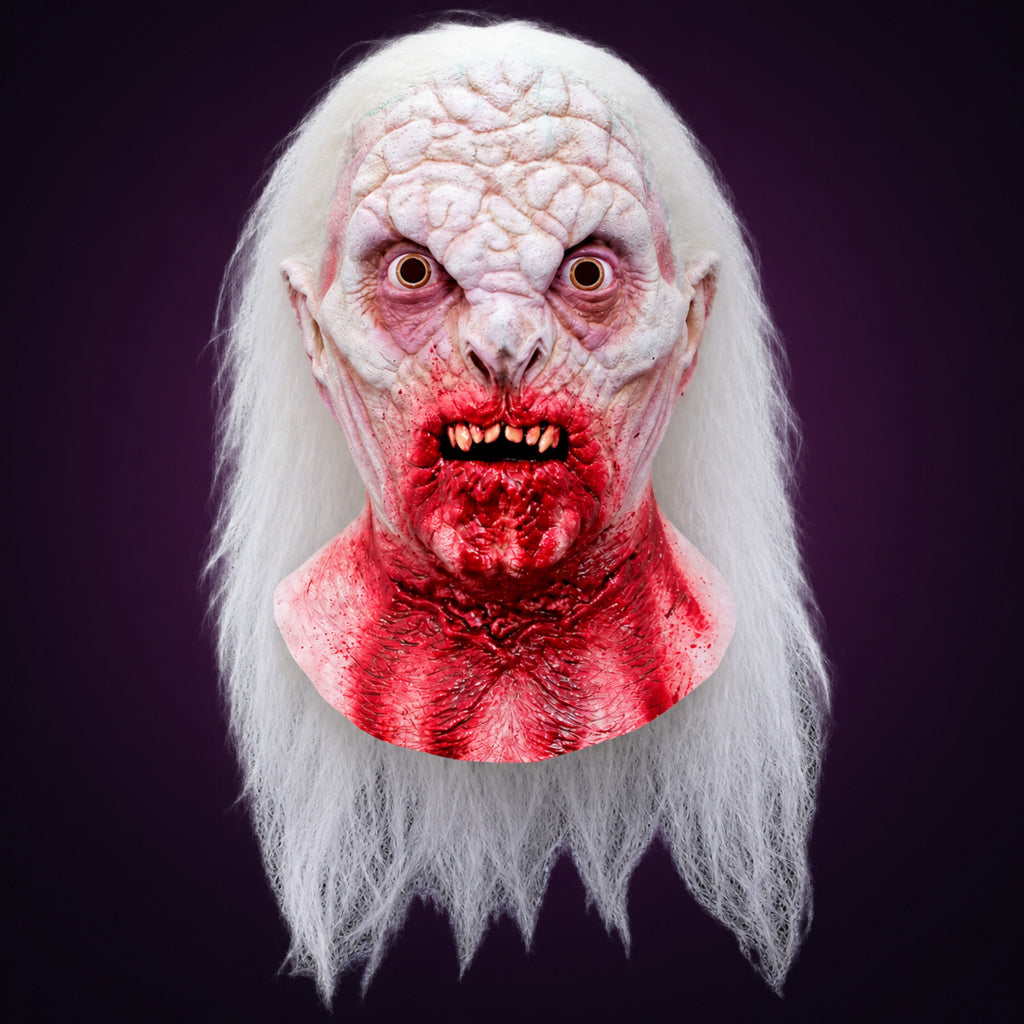 Bram Stoker's Dracula DRACULA DEAD mask, view 1, against a smooth dark aubergine gradient background