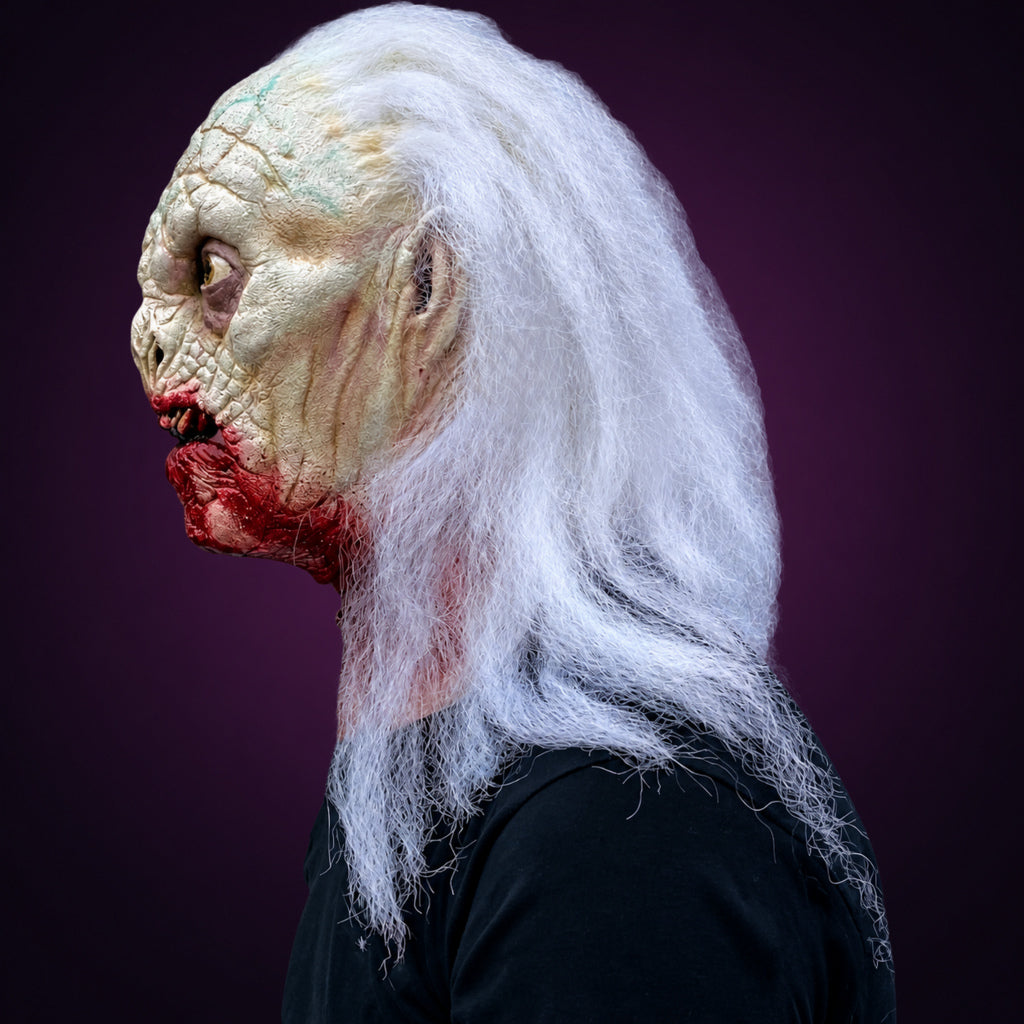Bram Stoker's Dracula DRACULA DEAD mask, view 2, against a smooth dark aubergine gradient background