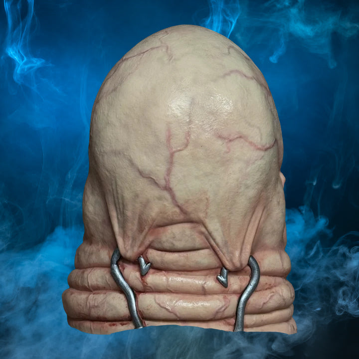 Butterball Hellraiser mask – view 2 with blue smoke background matching the original hero image