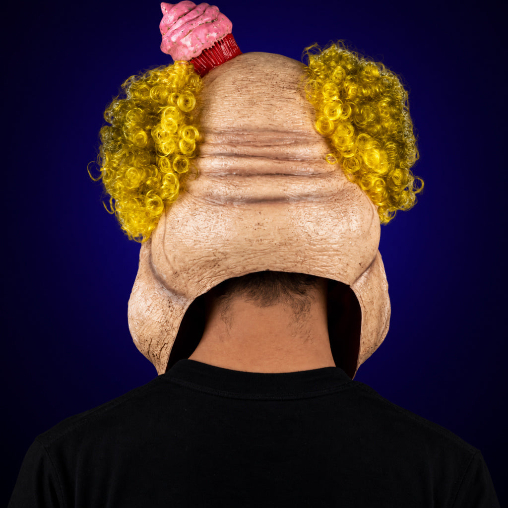 Charles Demon of Gluttony mask, view 5, against a smooth dark indigo gradient background
