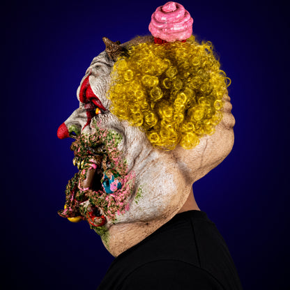 Charles Demon of Gluttony mask, view 6, against a smooth dark indigo gradient background
