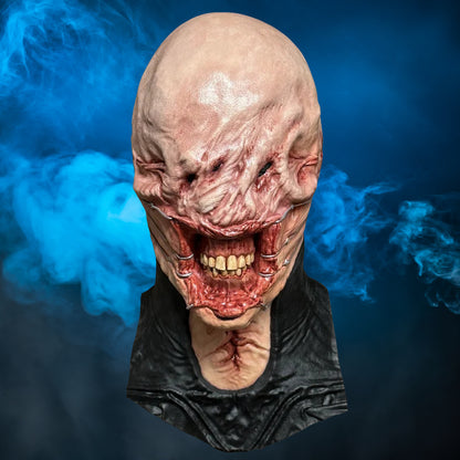 Chatterer Hellraiser mask – view 4 with blue smoke background matching the original hero image