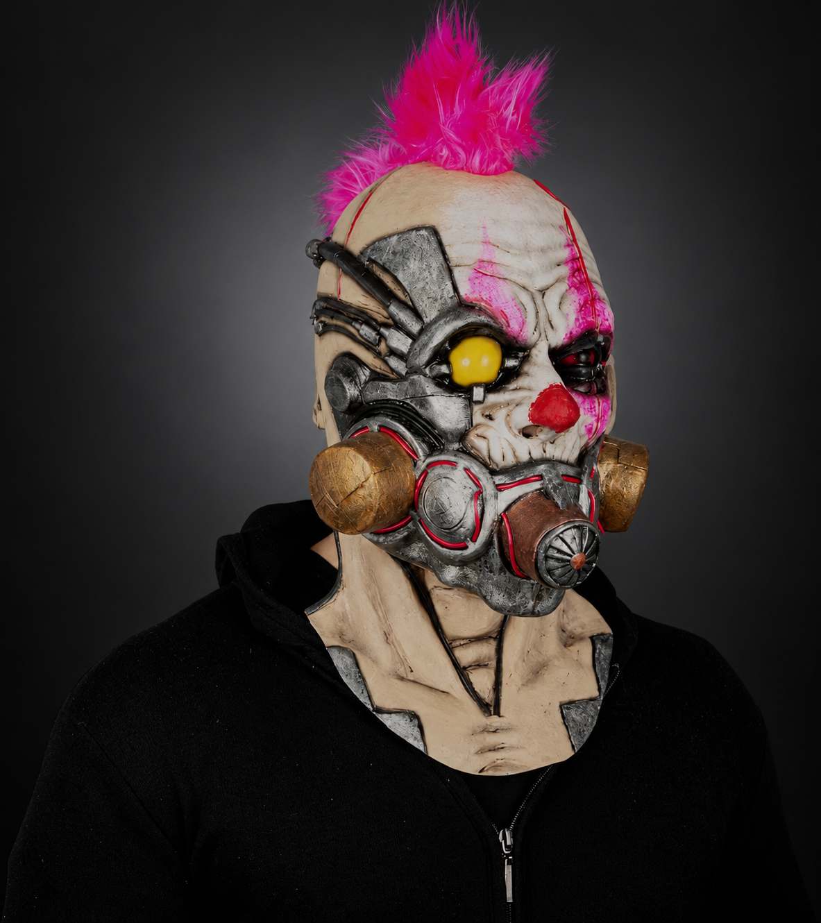 Clown Muzzle mask, right-facing angled view on model against smooth dark charcoal and grey gradient