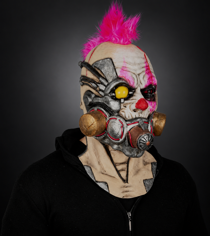 Clown Muzzle mask, right-facing angled view on model against smooth dark charcoal and grey gradient