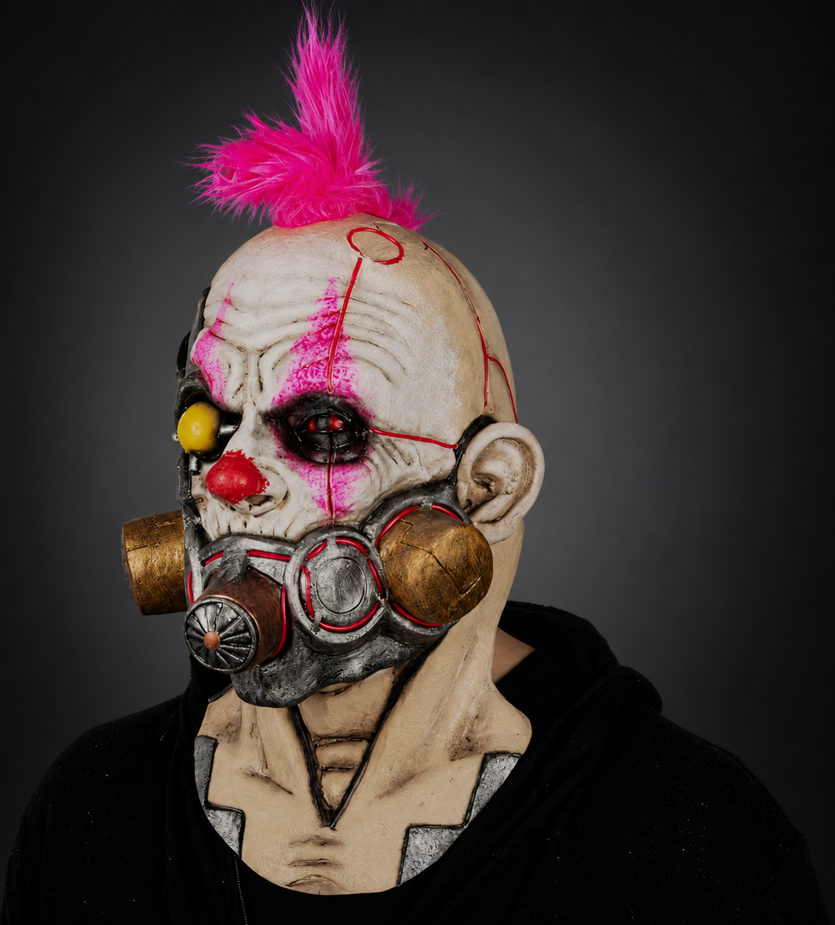 Clown Muzzle mask, left-facing angled view on model against smooth dark charcoal and grey gradient