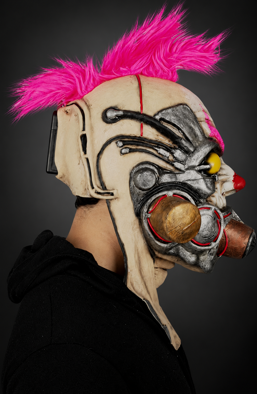 Clown Muzzle mask, right profile against smooth dark charcoal and grey gradient
