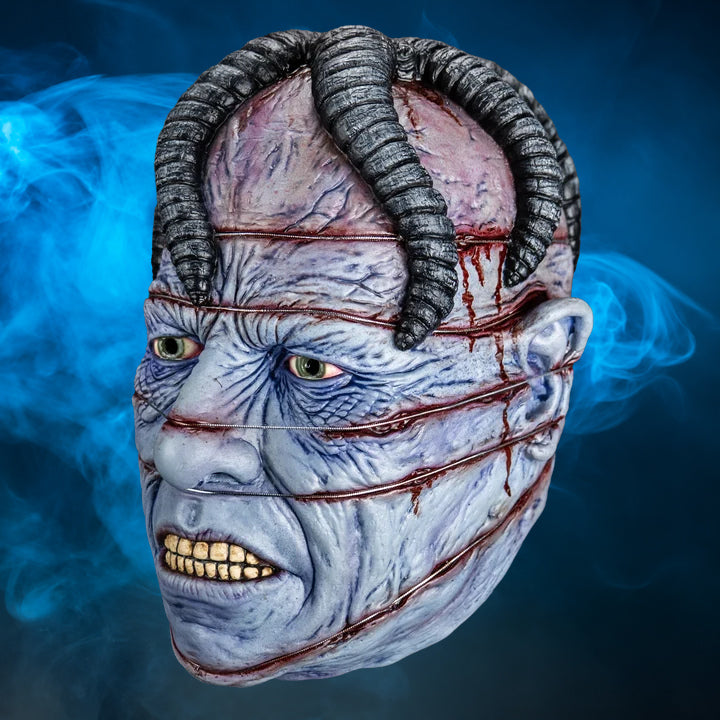 Dr. Channard Hellraiser mask – view 3 with blue smoke background matching the original hero image