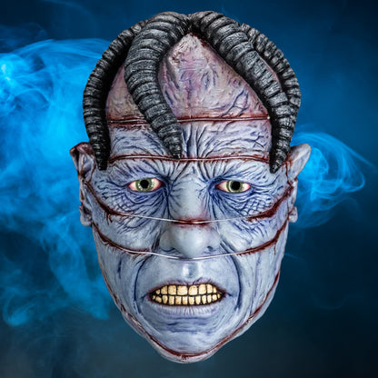 Dr. Channard Hellraiser mask – view 4 with blue smoke background matching the original hero image