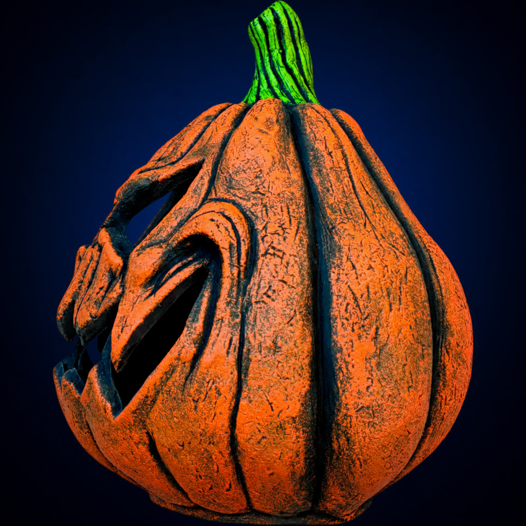 Jack O'Lantern Pumpkin decoration, view 2, against a smooth dark midnight-blue gradient background