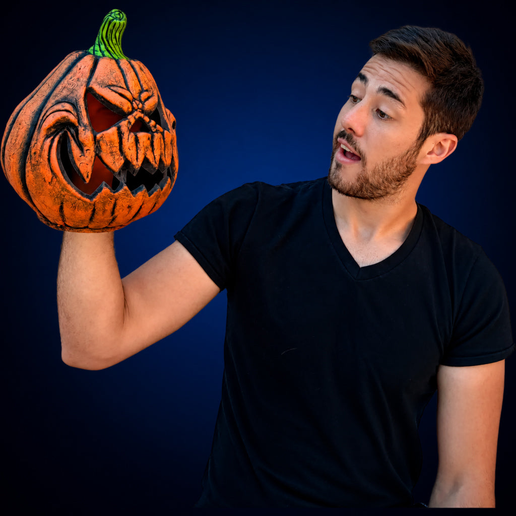 Jack O'Lantern Pumpkin decoration, view 5, against a smooth dark midnight-blue gradient background