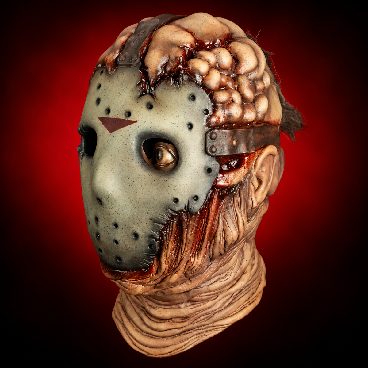 Jason Goes to Hell '93 Jason mask, opposite angled view against radiant red background