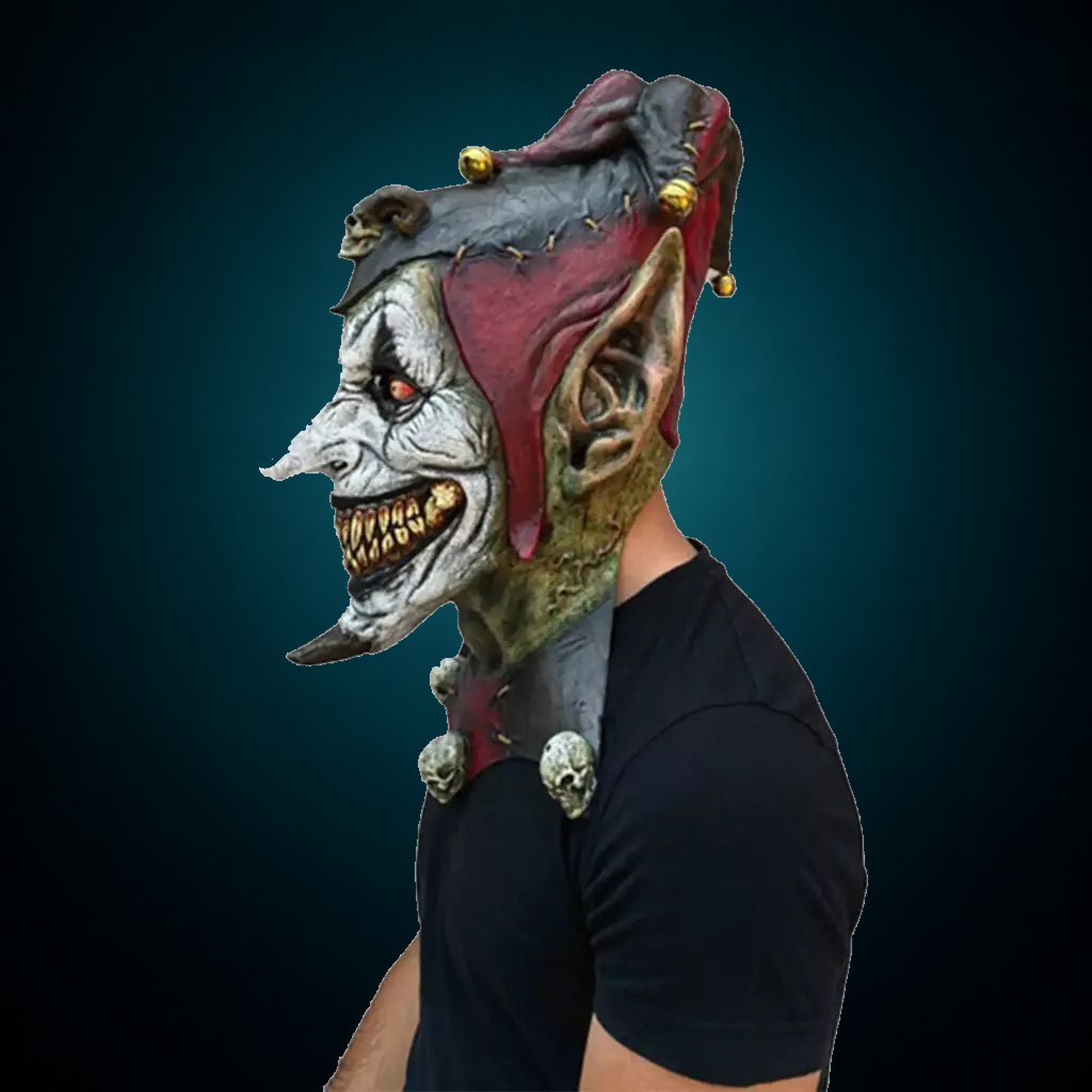 Jesterblin mask, view 4, against consistent dark petrol teal gradient