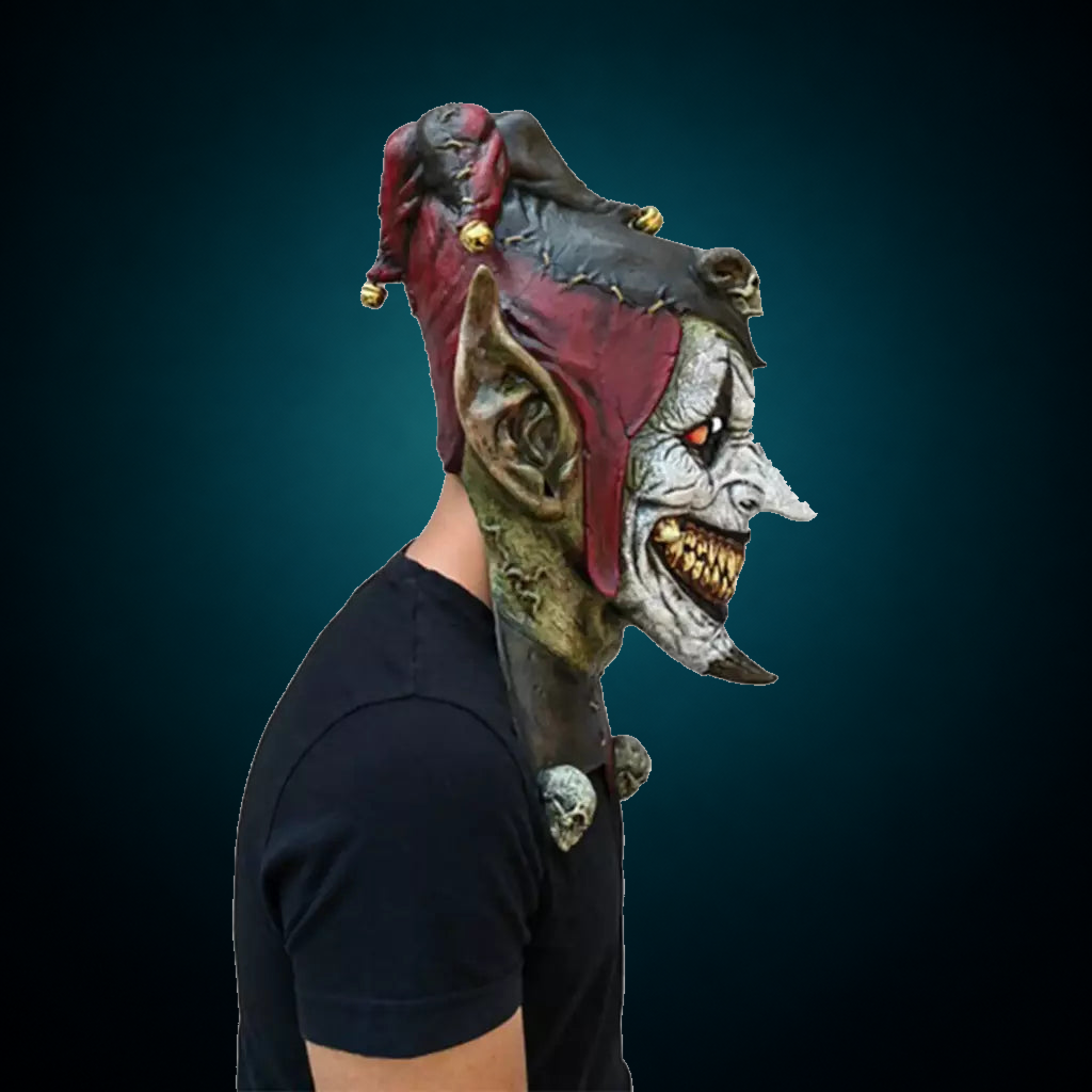 Jesterblin mask, view 5, against consistent dark petrol teal gradient