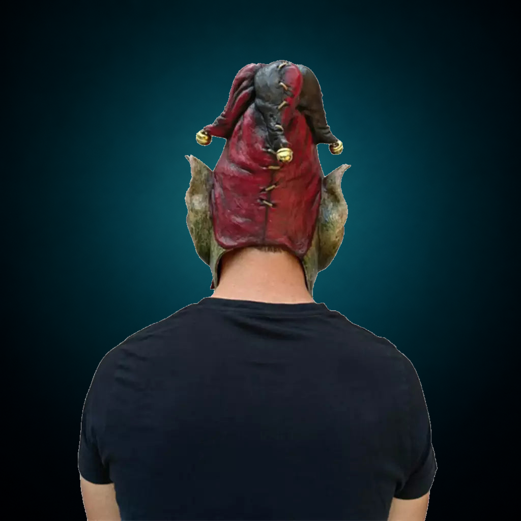 Jesterblin mask, view 6, against consistent dark petrol teal gradient