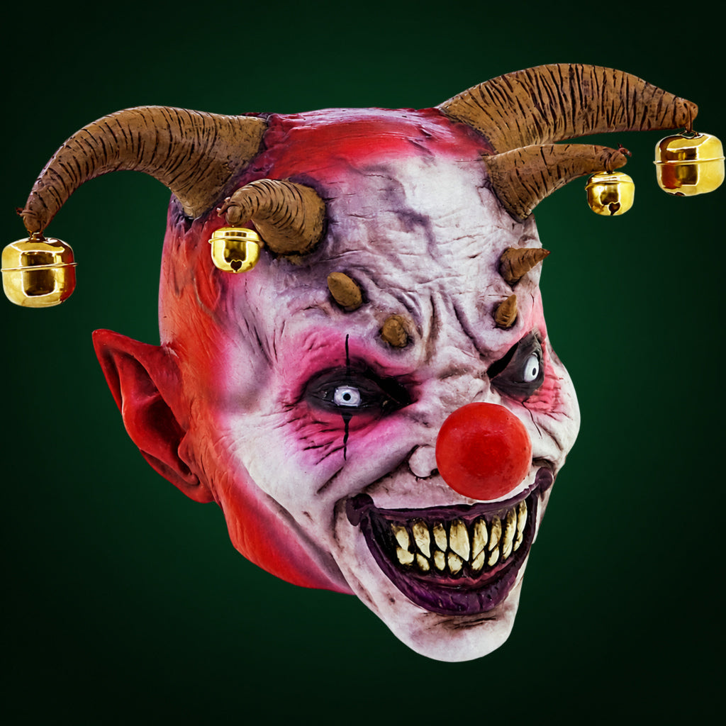 Jingle Jangle mask, view 1, against a smooth dark evergreen gradient background