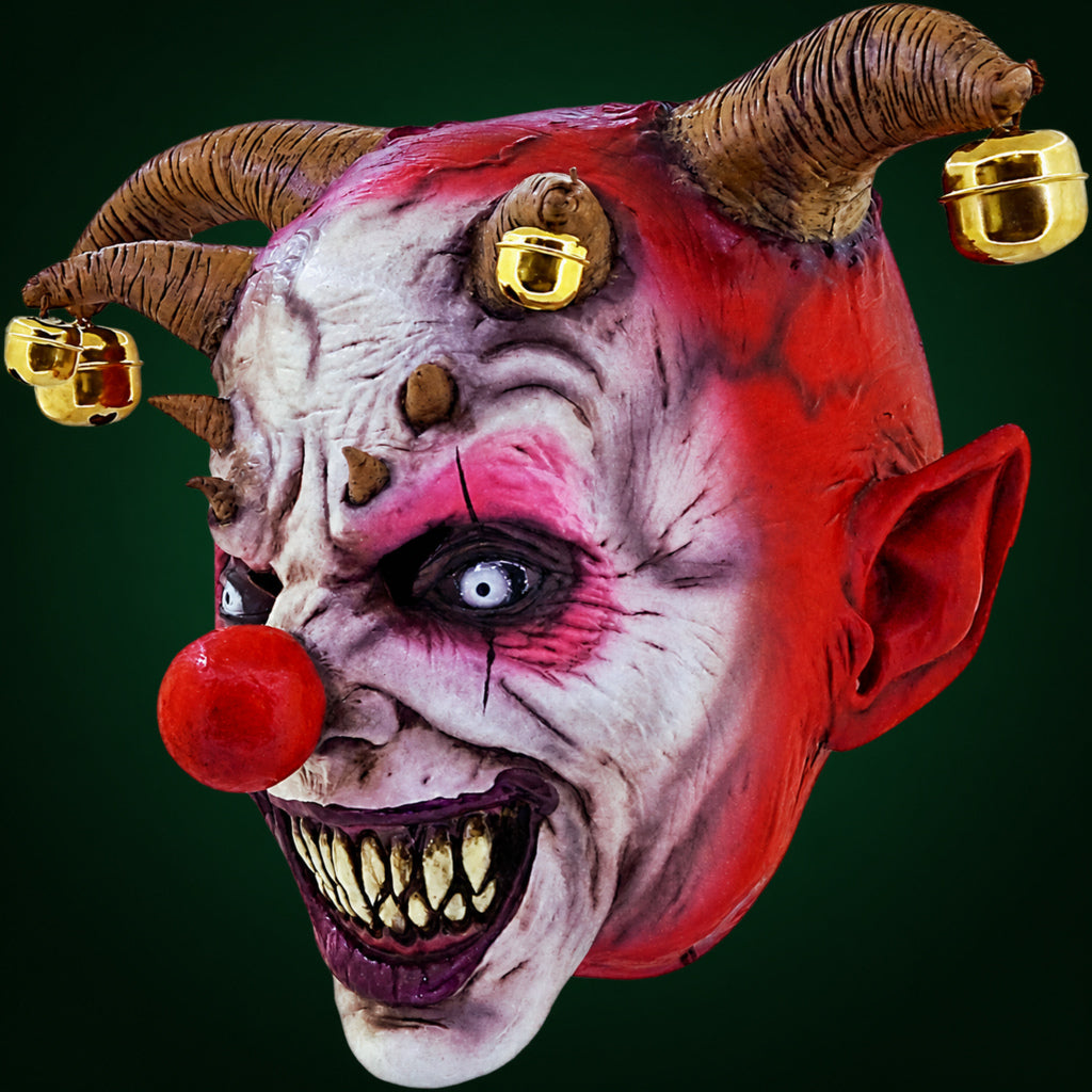 Jingle Jangle mask, view 3, against a smooth dark evergreen gradient background