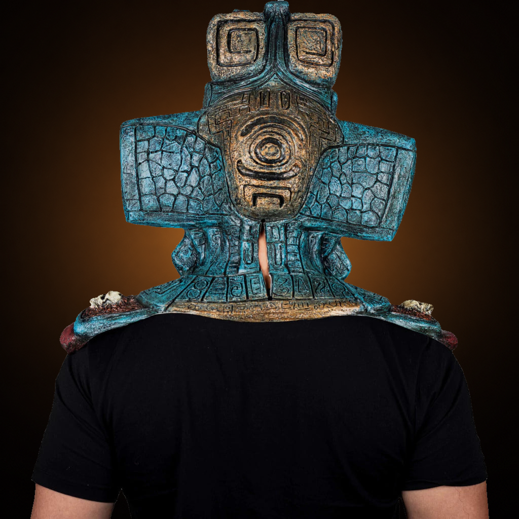 Mictlantecuchtli mask, view 8, against consistent smooth dark bronze amber gradient