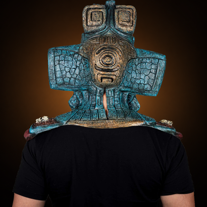 Mictlantecuchtli mask, view 8, against consistent smooth dark bronze amber gradient