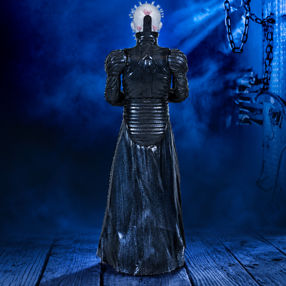 Pinhead 8-inch Hellraiser figure, rear view against a blue industrial background