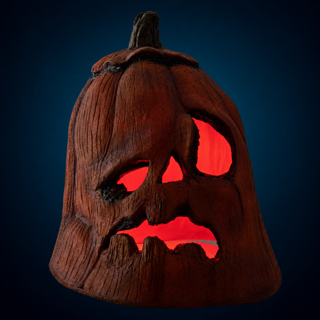 Rotten Pumpkin 1 decoration, view 5, against a smooth dark blue-teal gradient background