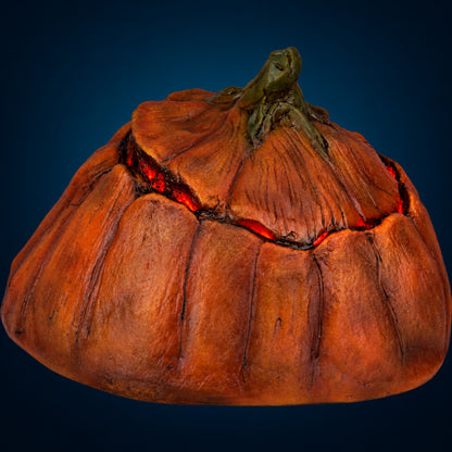 Rotten Pumpkin 3 decoration, view 3, against a smooth dark blue-teal gradient background
