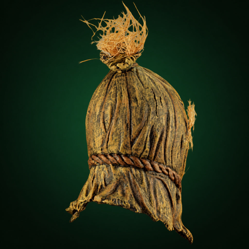 Scareborn mask, view 3, against a smooth dark forest-green gradient background