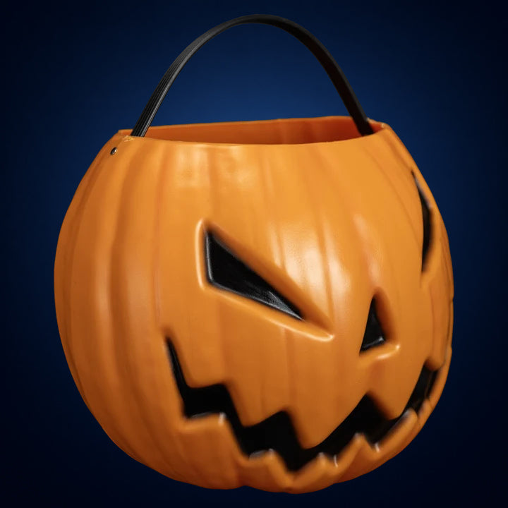 Sleepy Hollow Pumpkin candy pail – angled front view on midnight-blue gradient