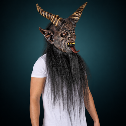 The Krampen mask, view 3, against a smooth dark slate-teal gradient background