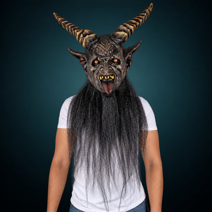 The Krampen mask, view 7, against a smooth dark slate-teal gradient background