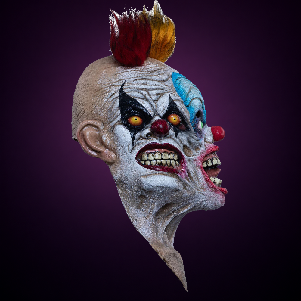 Tripolar Clown mask, view 2, against consistent smooth dark aubergine gradient