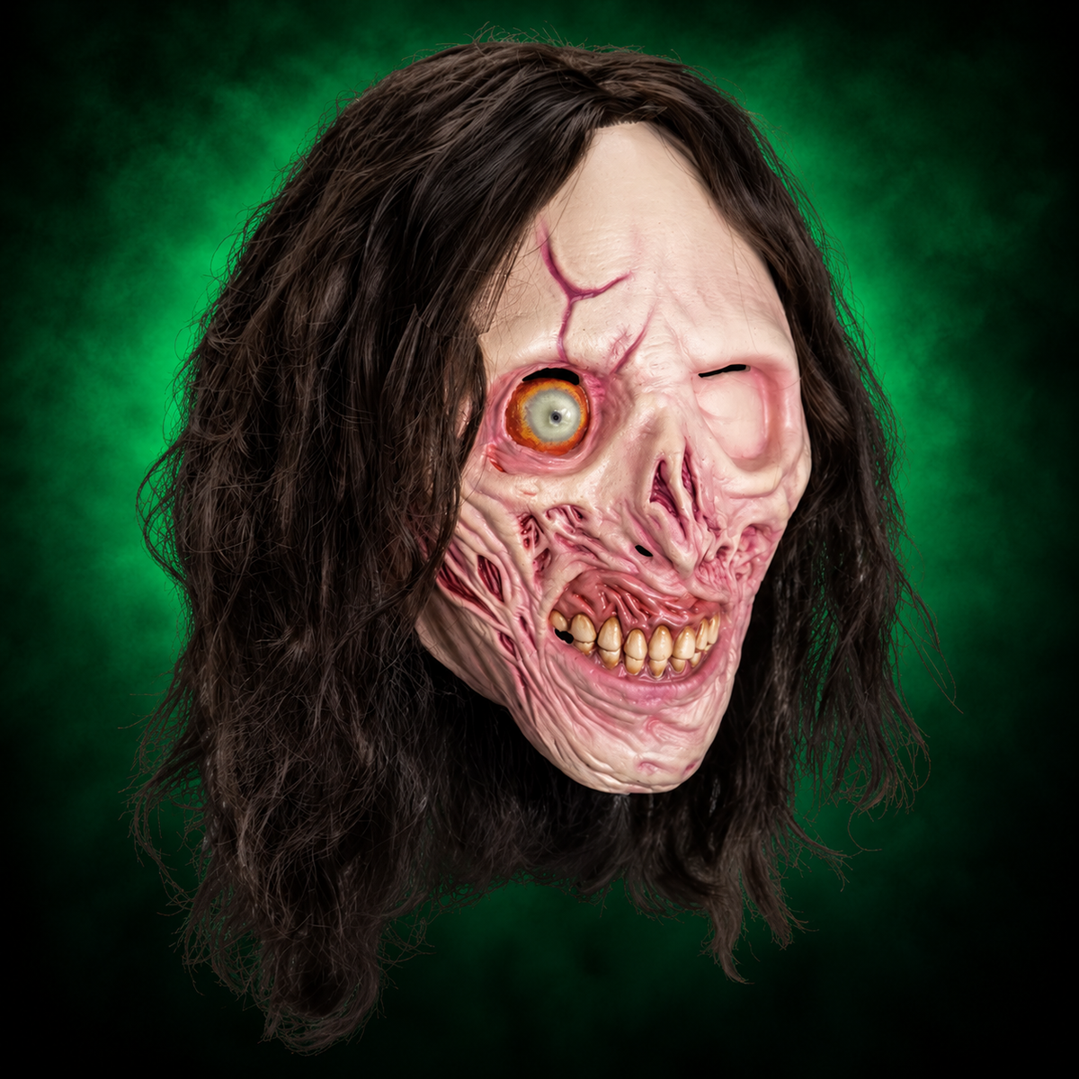 Victoria Heyes Terrifier 2 mask, right-facing angled view against green gradient background
