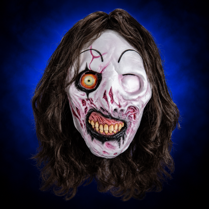 Victoria Heyes Terrifier 3 mask, front view against blue gradient background