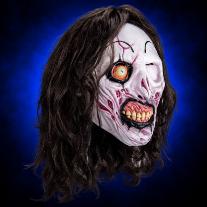 Victoria Heyes Terrifier 3 mask, right-facing angled view against blue gradient background