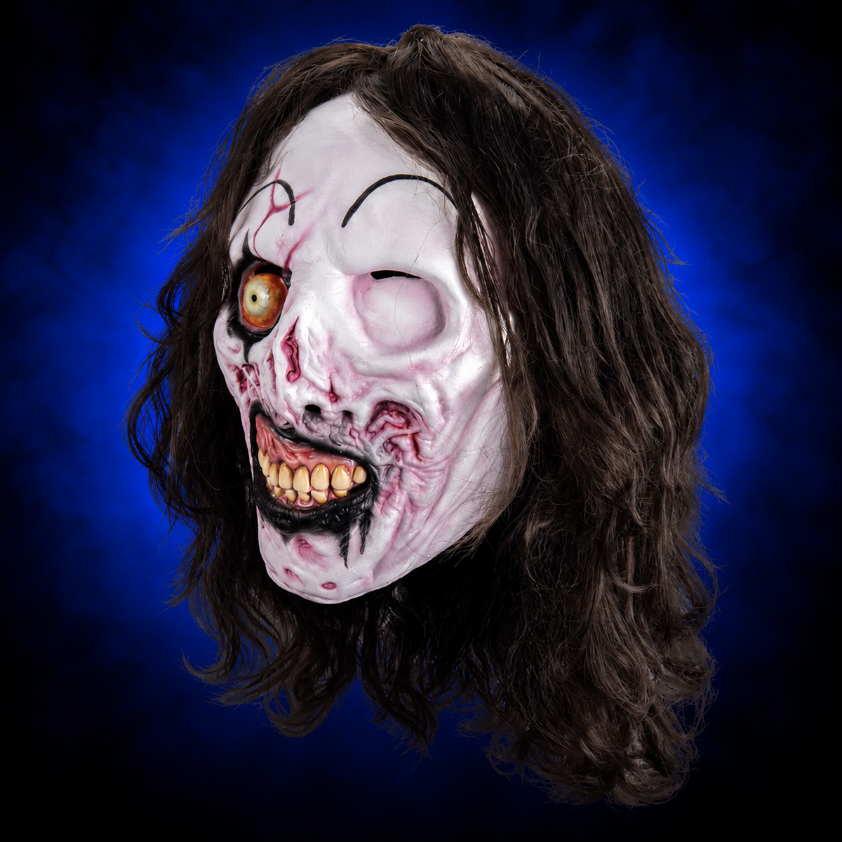 Victoria Heyes Terrifier 3 mask, left-facing angled view against blue gradient background