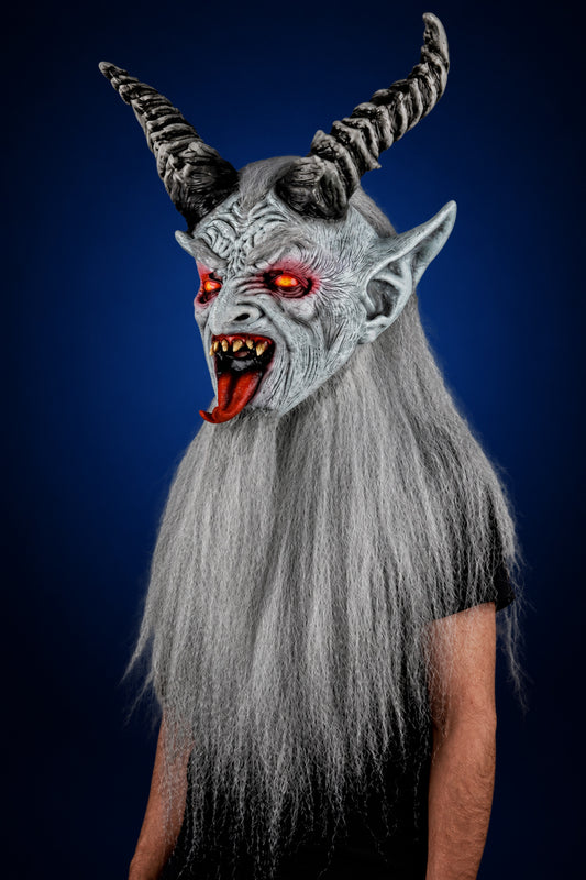 Winter Krampen mask, view 1, against a smooth dark midnight-blue gradient background