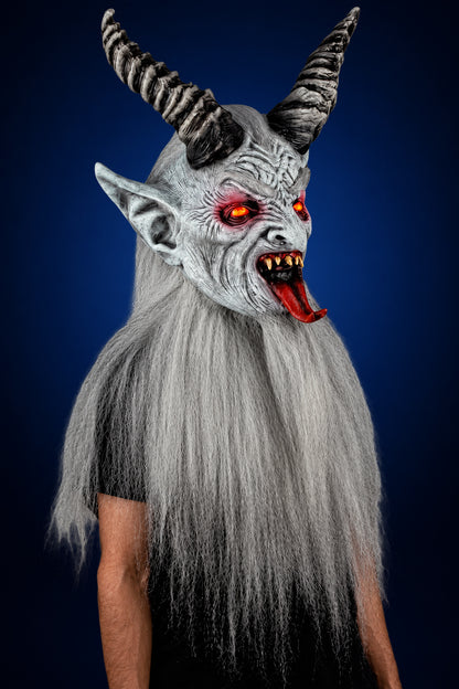 Winter Krampen mask, view 2, against a smooth dark midnight-blue gradient background