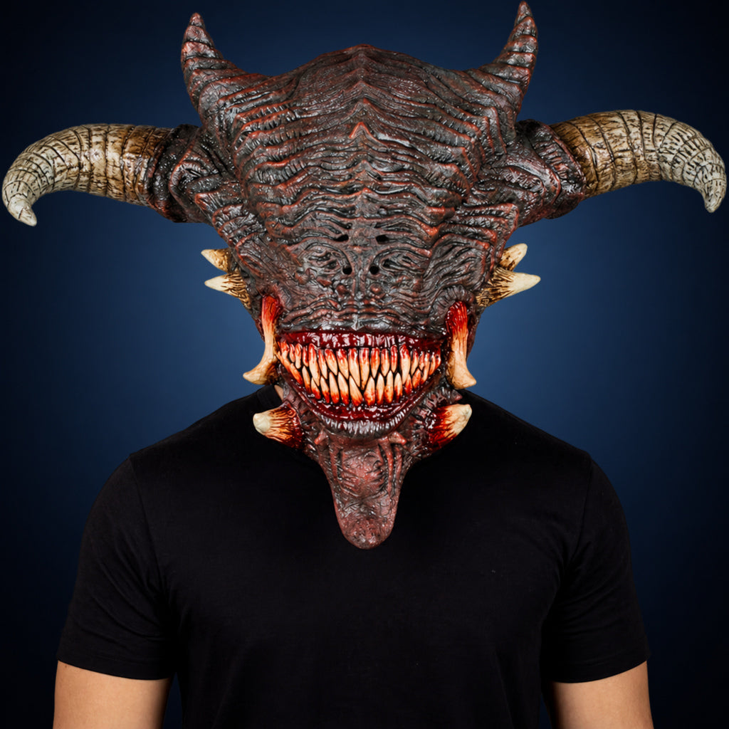 Wrath mask, view 2, against a smooth dark steel-blue gradient background