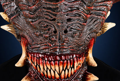 Wrath mask, view 6, against a smooth dark steel-blue gradient background